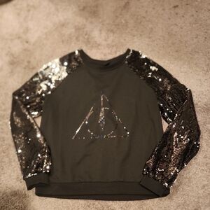 Warner Bros. Black Sweater with Silver Sequin Sleeves